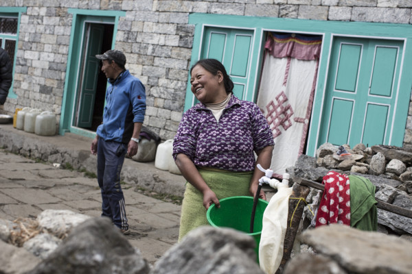 Padam Maya Rai, 4o, washes clothes outside her home in Lukla, Nepal, on Feb 20th 2016. 

The Himalayan Trust has funded numerous civil projects here including modern water infrastructure and a school.  The local community – which used to have to carry water from a nearby well – has invested in the water project, which includes monthly bills to sustain its upkeep.